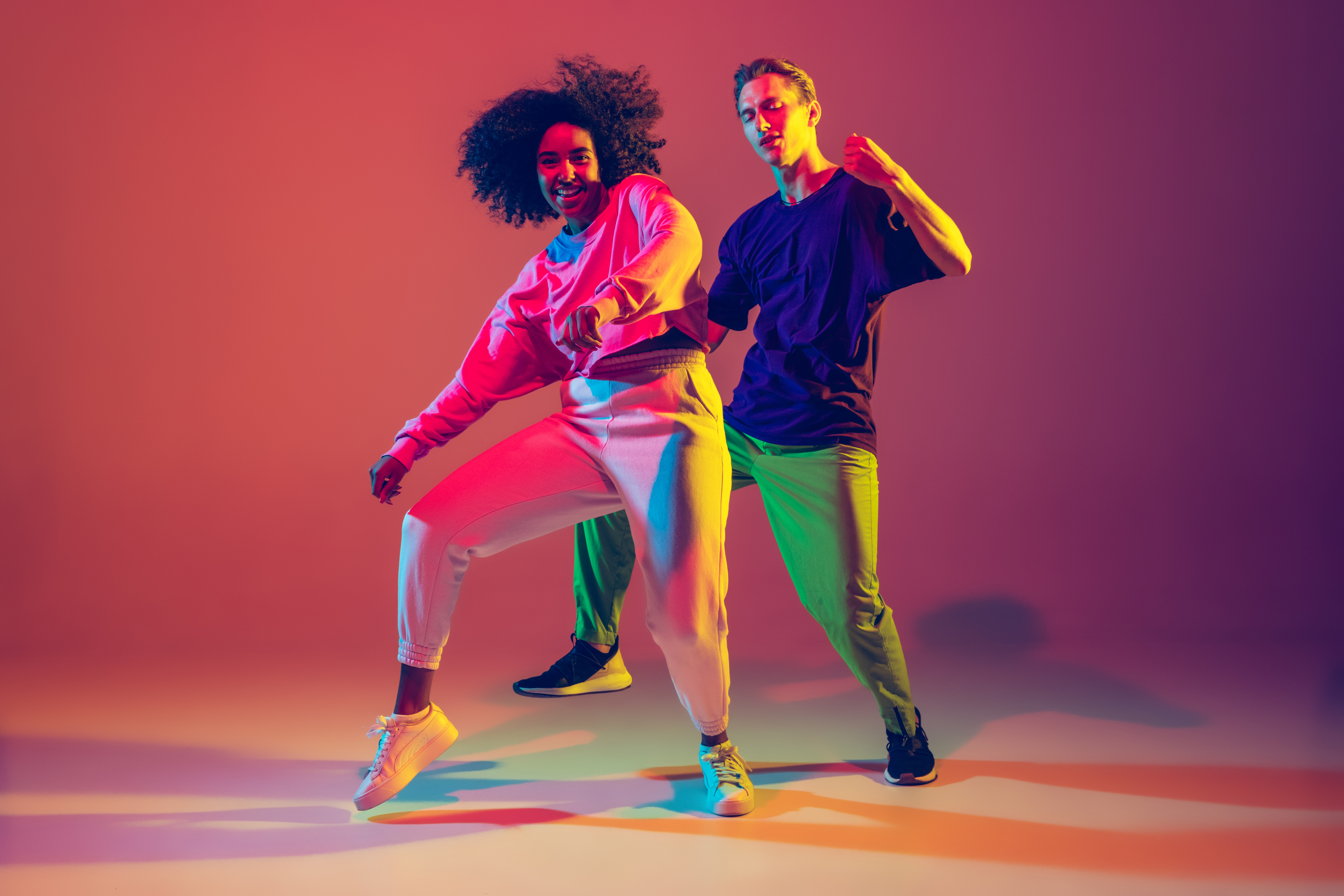men-and-woman-smiling-dancing